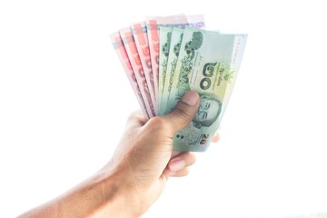 Hand with money isolated on a white background