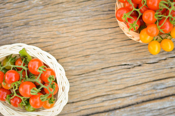 Hipster tone Top view group of tomato on old wood background, selective and soft focus