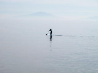 Lonely paddleboarder on the Marmara sea