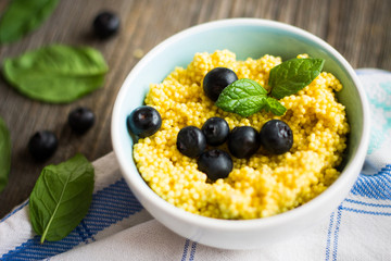 Puree of Millet Grains with Blueberries and Raw Ingredients