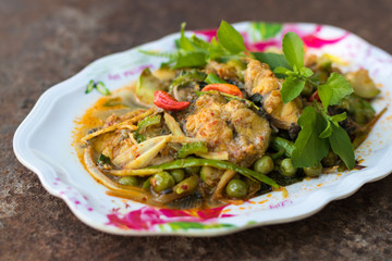 Curry catfish on rust.