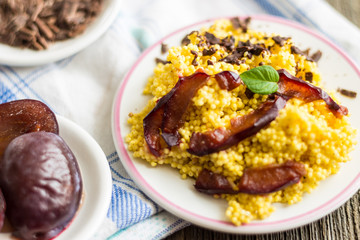 Puree of Millet Grains with Plums, Chocolate and Walnuts.