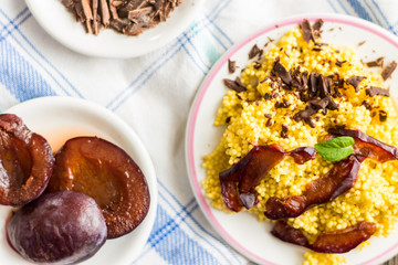 Dessert. Puree of Millet Grains with Plums, Chocolate and Walnuts and Raw Ingredients