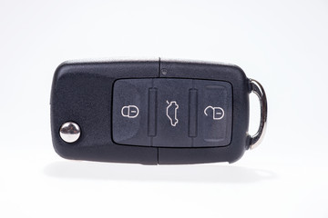 Black car key with remote central locking isolated