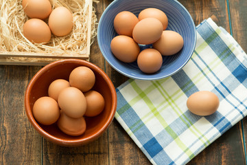 Raw eggs on a blue napkin