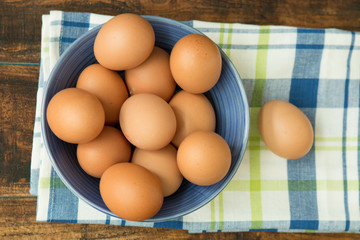 Raw eggs on a blue napkin
