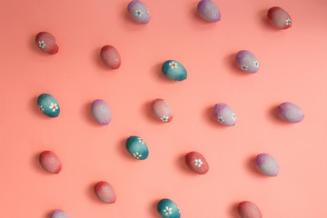 Colourful Easter Eggs on a pink background