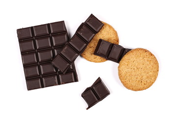 chocolate bars and round wholewheat biscuits with hazelnut isolated on white background