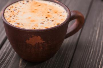 old vintage mug with aromatic coffee