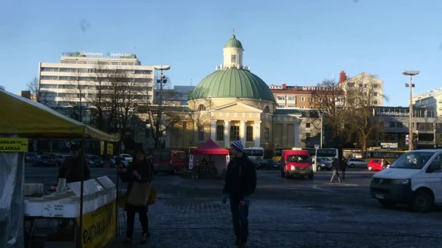 TURKU, VARSINAIS-SUOMI, FINLAND, JANUARY 26 Timelapse of people at turku market the kauppatori, at a evening, in Turku, Varsinais-suomi, Finland
