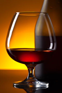  bottle and glass of brandy