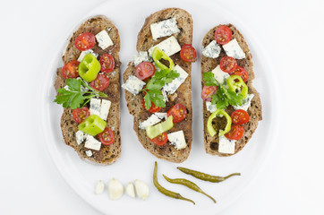 Healthy Breakfast. Home Baked Bread With Olive Pesto, Blue Cheese, Vegetables And Spices Top View