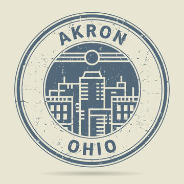 Grunge rubber stamp or label with text Akron, Ohio