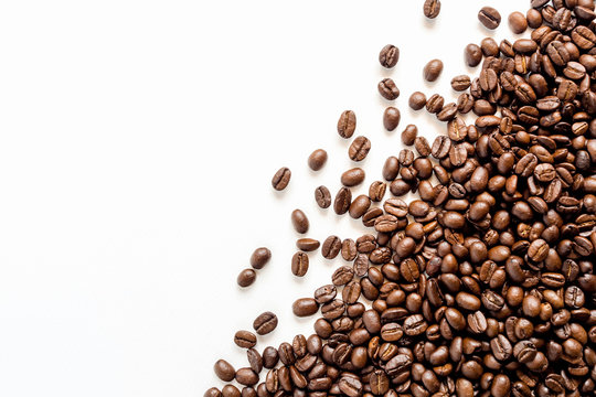 Roasted coffee beans on white. © Lifestyle Graphic