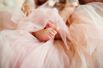 Bare feet of newborn