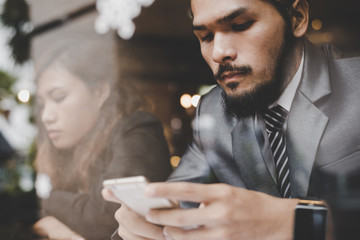 Business friends take a break at coffee bar, Drinking coffee.