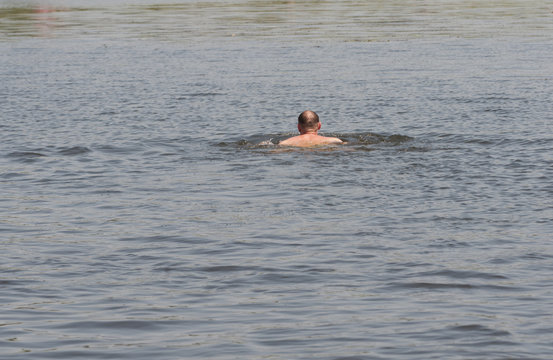Swimming alone in a lake
