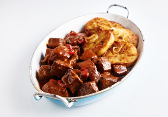 Serviettenknodel bread dumplings with goulash
