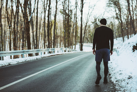 Athletic Young Man Running In The Nature. Healthy Lifestyle - Burning Calories