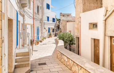 Typical street of small village on Levanzo island, the smallest of the Egadi, Trapani, Italy