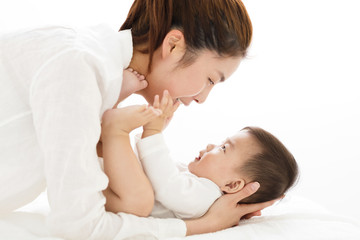 Fototapeta na wymiar young asian Mother holding sweet baby boy