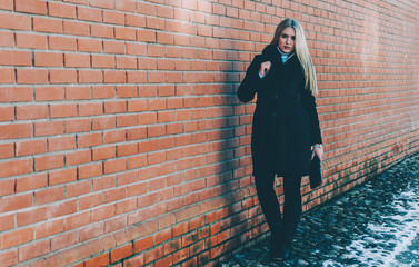 Girl Near The Brick Wall