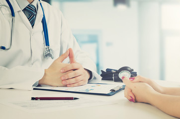 Doctor and patient medical consultation