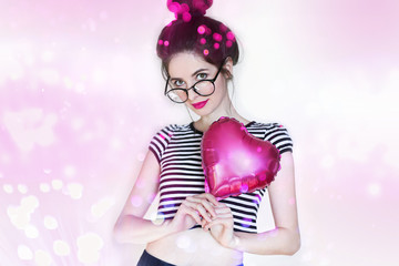 Valentine’s Day - Smiling Young Woman in Striped T-shirt Holding Pink Heart Balloon