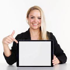 Woman presenting tablet pc with copyspace © Karin & Uwe Annas