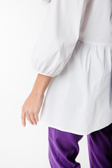 Details of women's clothing. Detail dress on a model on a white background