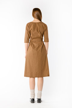 Details of women's clothing. Detail dress on a model on a white background