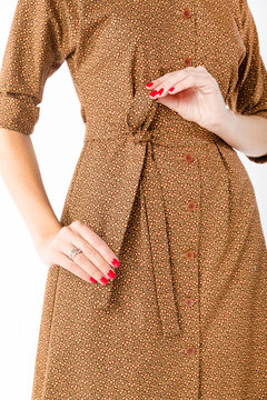 Details of women's clothing. Detail dress on a model on a white background