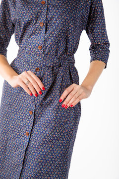 Details of women's clothing. Detail dress on a model on a white background