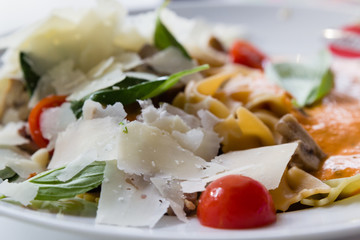 ceasar salad on white plate closup