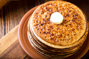 Thick pancakes with butter