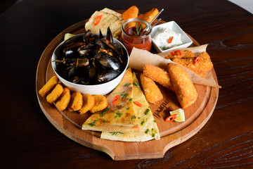 set includes mussels, chicken nuggets,stripsy and cheese pie