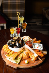 set includes mussels, chicken nuggets,stripsy and cheese pie