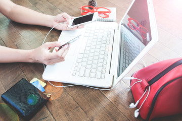 Woman hand holding credit card and using mobile device and laptop, Online shopping concept