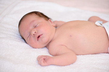 Fototapeta na wymiar After childbirth newborn baby