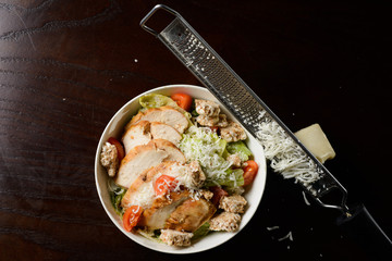 healthy salad with meat, tomatoes, lettuce
