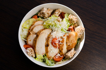 healthy salad with meat, tomatoes, lettuce