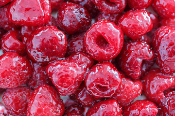 bokeh background of raspberries with jelly. pink, red background