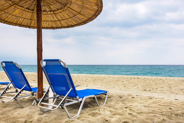 Empty beach chairs. Greece