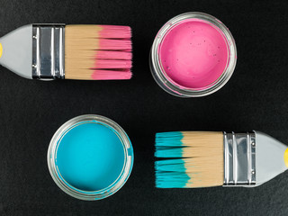 Tin of Blue and Pink Paint with Paint Brushes