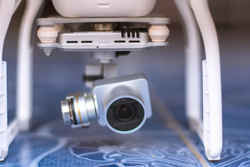 Equipment camera white drone, quadrocopter with photo camera flying concept.