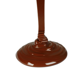 Melted chocolate dripping on white background