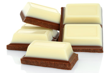 Broken chocolate bars on white background