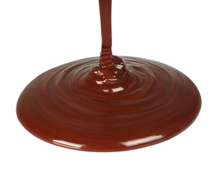 Melted chocolate dripping on white background