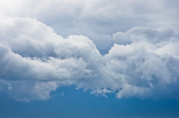 Picturesque rainy clouds against blue sky at spring in Belgrade, Serbia