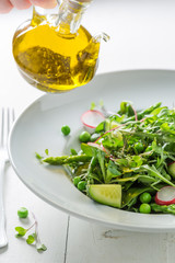 Spring green salad with mix of vegetables